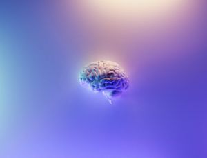 Glowing purple blue yellow brain light shining down in the centre of image with a light yellow and purple ombre background